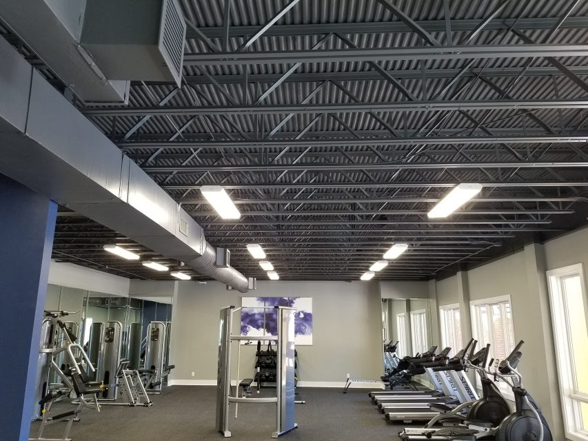 amenity renovation fitness center gym painting flooring lighting rafters hvac