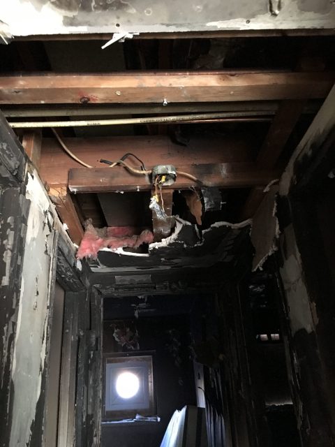 apartment fire damage studs insulation sheetrock remediation
